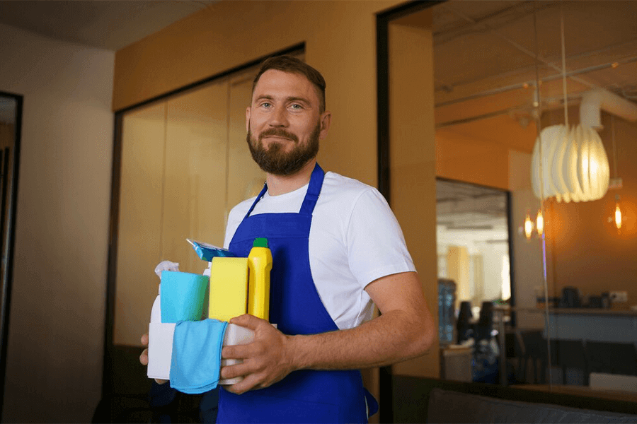 Trained cleaning professionals maintaining cleanliness in an office space.